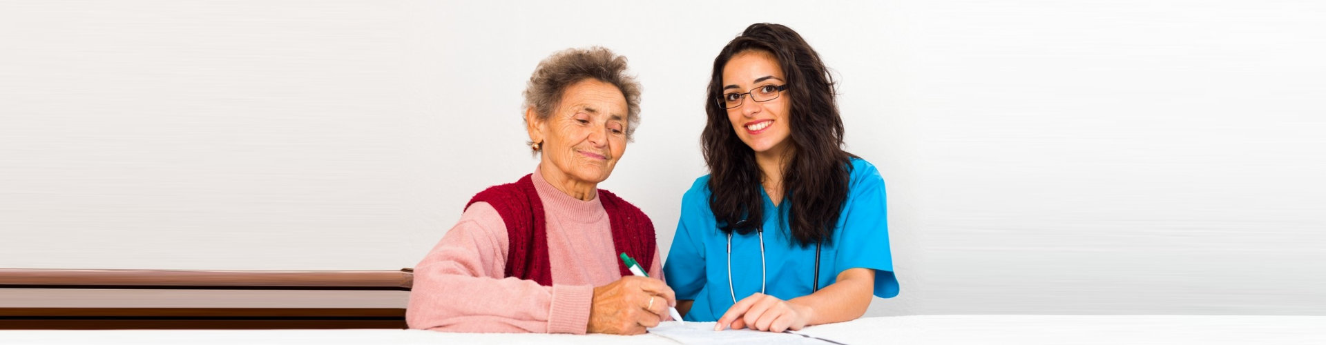 image of an elderly woman with a female caregiver